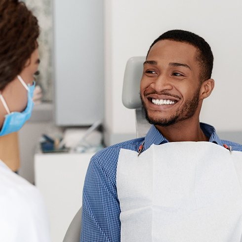 Man smiling after getting dental bonding in Brecksville